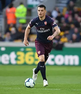 Wolverhampton Wanderers V Arsenal 2018-19 Prints: Granit Xhaka in Action: Wolverhampton Wanderers vs Arsenal FC, Premier League 2018-19