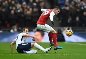 Images Dated 10th February 2018: Granit Xhaka (Arsenal) Harry Kane (Tottenham)