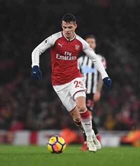 Images Dated 16th December 2017: Granit Xhaka: Arsenal Midfielder in Action against Newcastle United, Premier League 2017-18