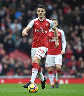 Images Dated 11th March 2018: Granit Xhaka: Arsenal Midfielder in Action Against Watford, Premier League 2017-18
