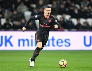 West Ham United V Arsenal 2017-18 Prints: Granit Xhaka: Arsenal Midfielder in Action Against West Ham United, Premier League 2017-18