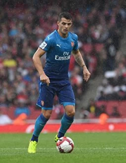 Arsenal v Benfica - Emirates Cup 2017-18 Collection: Granit Xhaka: Arsenal's Midfield Maestro in Action against SL Benfica, Emirates Cup 2017-18