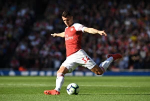 Arsenal v Watford 2018-19 Collection: Granit Xhaka: Arsenal's Midfield Maestro in Action Against Watford, Premier League 2018-19