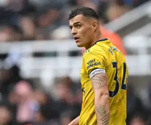 Newcastle United V Arsenal 2019-20 Prints: Granit Xhaka: Arsenal's Midfield Maestro in Action against Newcastle United