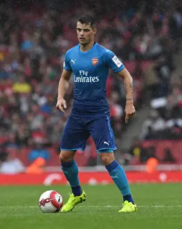 Granit Xhaka: Arsenal's Midfield Maestro in Action against SL Benfica, Emirates Cup 2017-18