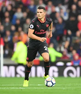 Granit Xhaka: Arsenal's Midfield Maestro in Action Against Stoke City, Premier League 2017-18