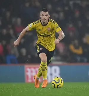 Granit Xhaka: Arsenal's Midfield Maestro in Action vs. AFC Bournemouth, Premier League 2019-20