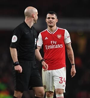 Images Dated 7th January 2020: Granit Xhaka: Arsenal's Midfield Maestro Shines in FA Cup Clash Against Leeds United