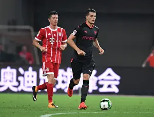 Bayern Munich V Arsenal 2017-18 Prints: Granit Xhaka: Arsenal's Midfield Maestro Shines Against Bayern Munich in Shanghai