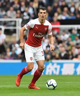 Newcastle United V Arsenal 2018-19 Prints: Granit Xhaka: Arsenal's Midfield Maestro Shines Against Newcastle United