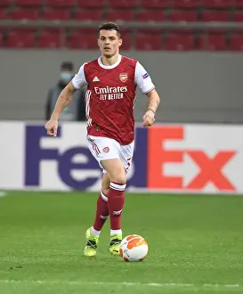 Granit Xhaka: Arsenal's Midfield Maestro in UEFA Europa League Clash vs SL Benfica (Piraeus, 2021)