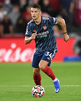 Brentford V Arsenal 2021-22 Prints: Granit Xhaka: Arsenal's Midfield Masterclass - Shining Against Brentford in the 2021-22 Premier League