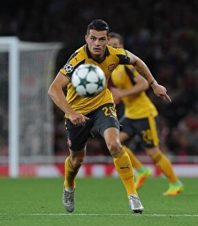 Arsenal v FC Basel 2016-17 Collection: Granit Xhaka: Arsenal's Midfield Masterclass in UEFA Champions League Battle Against FC Basel