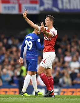Chelsea v Arsenal 2018-19 Collection: Granit Xhaka: Arsenal's Midfield Mastermind in Action against Chelsea, Premier League 2018-19