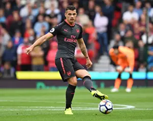 Stoke City V Arsenal 2017-18 Prints: Granit Xhaka: Arsenal's Midfield Mastermind in Action against Stoke City