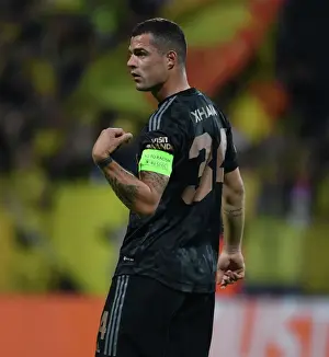 Bodø/Glimt V Arsenal 2022-23 Prints: Granit Xhaka: Arsenal's Midfield Mastermind Dazzles in Europa League Showdown vs