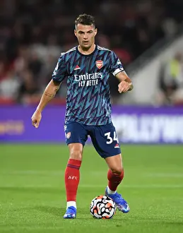 Brentford V Arsenal 2021-22 Prints: Granit Xhaka: Arsenal's Midfield Maven Dazzles in Arsenal's Victory Over Brentford (2021-22 Premier League)