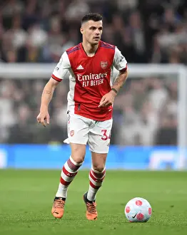 Tottenham Hotspur V Arsenal 2021-22 Prints: Granit Xhaka: Battle in the Heart of Arsenal's Midfield at Tottenham vs