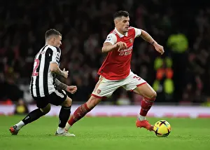 Arsenal V Newcastle United 2022-23 Prints: Granit Xhaka Breaks Past Kieran Trippier: Arsenal vs Newcastle United