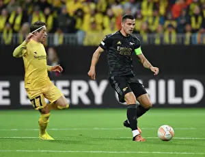 Bodø/Glimt V Arsenal 2022-23 Prints: Granit Xhaka Breaks Past Opponent in Arsenal's UEFA Europa League Clash vs