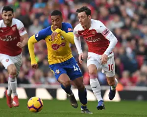 Arsenal V Southampton 2018-19 Prints: Granit Xhaka Breaks Past Southampton's Yan Valery in Arsenal's Premier League Clash