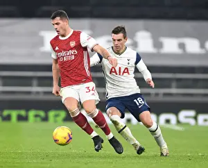 Tottenham Hotspur V Arsenal 2020-21 Prints: Granit Xhaka Breaks Past Tottenham's Lo Celso in 2020-21 Premier League Clash