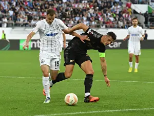 FC Zurich V Arsenal 2022-23 Prints: Granit Xhaka Clashes with Nikola Boranijasevic: FC Zurich vs