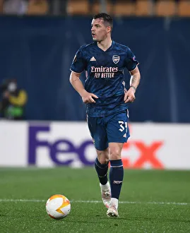 Granit Xhaka at Empty Estadio de la Ceramica: Arsenal's UEFA Europa League Semi-Final Showdown with Villarreal Amidst Coronavirus Restrictions
