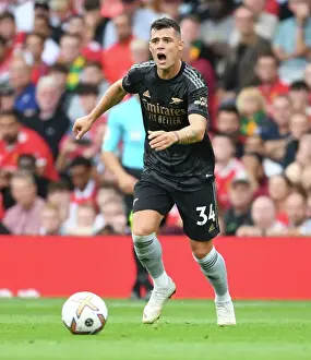 Manchester United V Arsenal 2022-23 Prints: Granit Xhaka Faces Off at Old Trafford: Manchester United vs