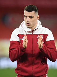 Granit Xhaka Gears Up: Arsenal's Silent Warrior at Empty Emirates for Slavia Praha - UEFA Europa League Quarterfinal