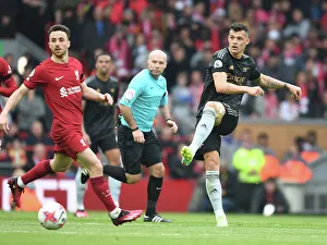 Liverpool V Arsenal 2022-23 Prints: Granit Xhaka: Midfield Warrior in the Liverpool vs. Arsenal Battle, Premier League 2022-23