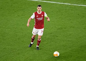 Arsenal V Dundalk 2020-21 Prints: Granit Xhaka Plays Alone: Arsenal's Empty Emirates Stadium in UEFA Europa League Match against Dundalk
