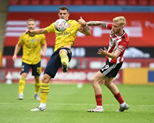 Granit Xhaka vs Olivier McBurnie: Intense Clash in FA Cup Quarterfinal between Sheffield United and Arsenal