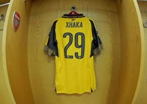 Images Dated 28th September 2016: Granit Xhaka's Arsenal Changing Room Moment before Arsenal vs FC Basel (2016-17)