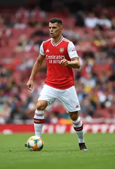 Granit Xhaka's Brilliant Performance: Arsenal Takes on Olympique Lyonnais in Emirates Cup