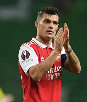Sporting Lisbon V Arsenal 2022-23 Prints: Granit Xhaka's Heartfelt Applause: Arsenal's Europa League Victory Over Sporting CP (Round of 16)