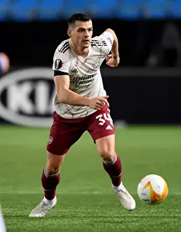 Molde FK V Arsenal 2020-21 Prints: Granit Xhaka's Midfield Masterclass: Arsenal's Winning Performance Against Molde FK