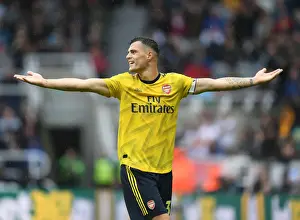 Newcastle United V Arsenal 2019-20 Prints: Granit Xhaka's Stellar Midfield Display: Arsenal Secures Victory over Newcastle United