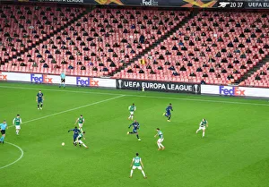 Great title! Here are some alternative suggestions: 1. Empty Seats and Europa League: Arsenal vs. Rapid Wien at Emirates Stadium (December 2020) 2. Ghostly Europa League: Arsenal's Emirates Stadium Showdown with Rapid Wien (December 2020) 3. Arsenal vs. Rapid Wien: A Silent Europa League Battle at Emirates Stadium (December 2020) 4. The Quiet Europa League: Arsenal and Rapid Wien Face Off at Emirates Stadium (December 2020) 5. Arsenal's Europa League Clash with Rapid Wien: A Game Behind Closed Doors (December 2020) 6. Arsenal vs. Rapid Wien: A Ghostly Europa League Encounter at Emirates Stadium (December 2020) 7. The Empty Stadium Europa League: Arsenal and Rapid Wien Battle it Out (December 2020) 8. Arsenal vs. Rapid Wien: A Europa League Showdown in an Empty Emirates Stadium (December 2020) 9. Arsenal's Europa League Match against Rapid Wien: A Game in an Empty Emirates Stadium (December 2020) 10. Arsenal vs. Rapid Wien: A Quiet Europa League Contest at Emirates Stadium (December 2020)