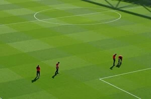 The groudstaff work on the pitch before the match. Arsenal 2: 0 West Bromwich Albion