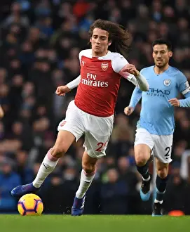 Manchester City V Arsenal 2018-19 Prints: Guendouzi in Action: Arsenal vs. Manchester City - Premier League Showdown (2018-19)