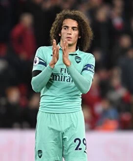 Images Dated 29th December 2018: Guendouzi Applauds Arsenal Fans at Anfield: Liverpool vs Arsenal, Premier League 2018-19