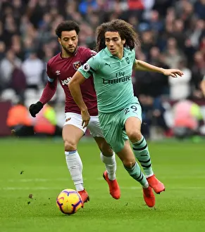 West Ham United V Arsenal 2018-19 Prints: Guendouzi vs. Anderson: Battle in the Premier League - West Ham United vs. Arsenal FC