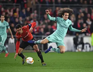Stade Rennes V Arsenal 2018-19 Prints: Guendouzi vs. Andre: A Midfield Battle in Arsenal's Europa League Clash with Rennes