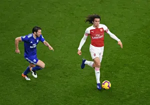 Arsenal V Cardiff City 2018-19 Prints: Guendouzi vs. Arter: A Battle of Midfielders in Arsenal vs. Cardiff Premier League Clash