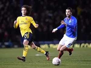 Portsmouth V Arsenal FA Cup 5th Rd 2020 Prints: Guendouzi vs Burgess: FA Cup Fifth Round Battle at Fratton Park