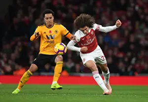 Arsenal V Wolverhampton Wanderers 2018-19 Prints: Guendouzi vs. Costa: A Premier League Showdown at the Emirates