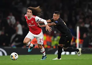 Arsenal V Vitoria Club 2019-20 Prints: Guendouzi vs. Duarte: A Battle in Arsenal's Europa League Clash against Vitoria Guimaraes