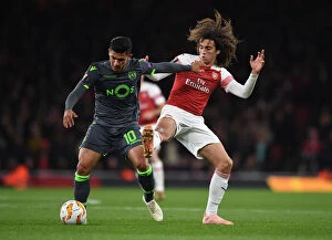 Images Dated 8th November 2018: Guendouzi vs Montero: Clash in the Europa League between Arsenal and Sporting CP