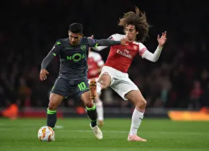 Arsenal V Sporting Clube De Portugal 2018-19 Prints: Guendouzi vs Montero: Clash in the Europa League between Arsenal and Sporting CP